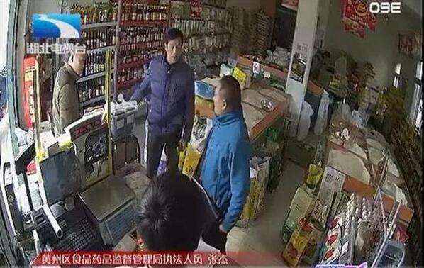 湖北黄冈食药监强搬36瓶食用油：我是依法抢劫(组图)